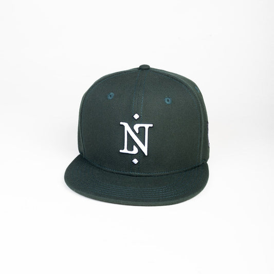 Green cap with a white logo on a white background